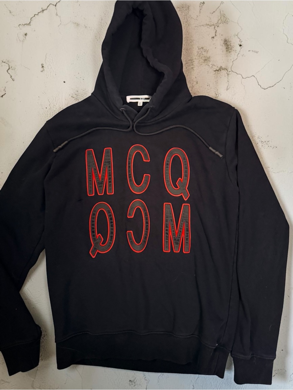 Alexander McQueen Black Hoodie with Red Logo Embroidery